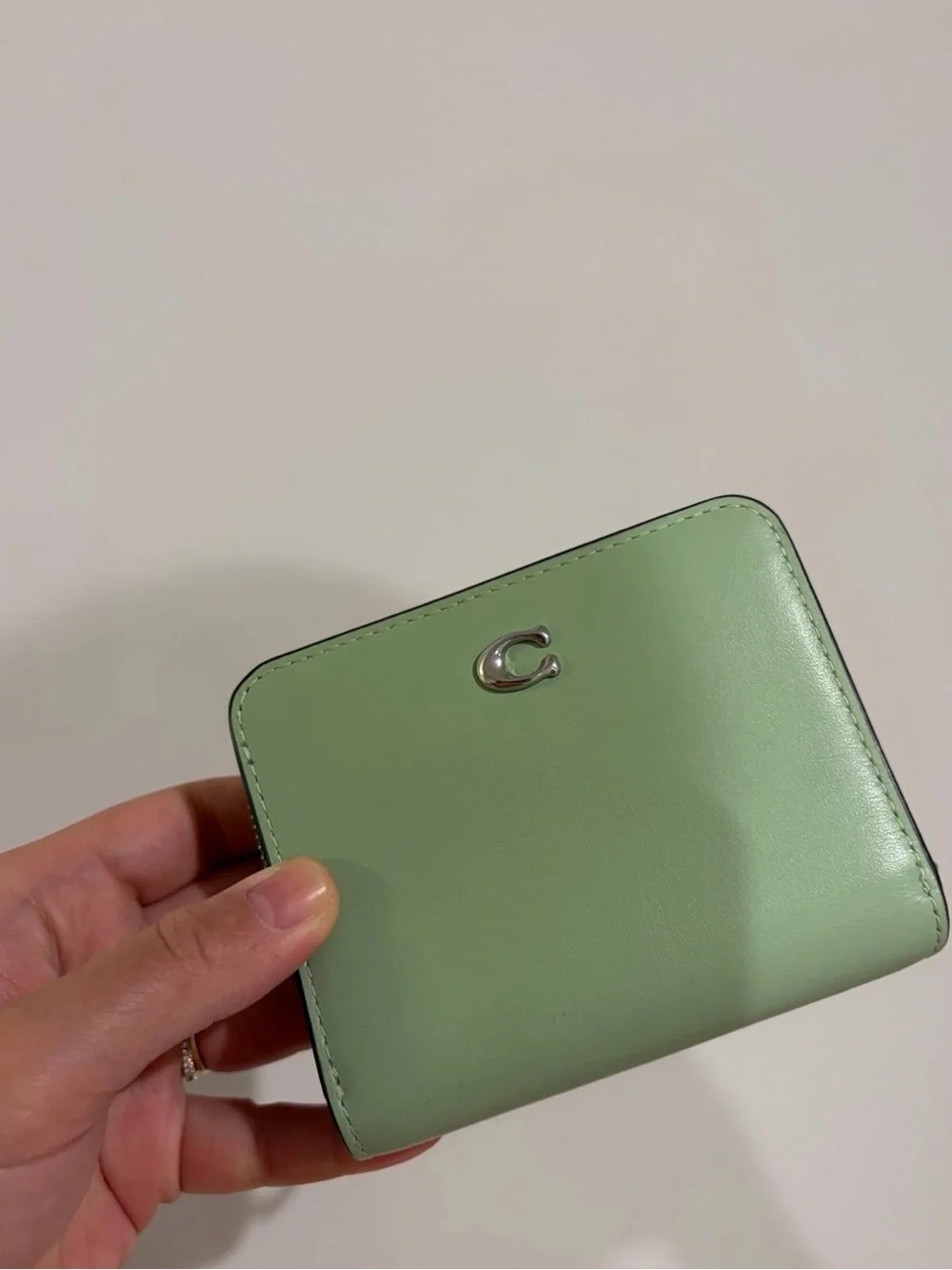 Coach billfold wallet EUC pale pistachio/silver hardware retails $150